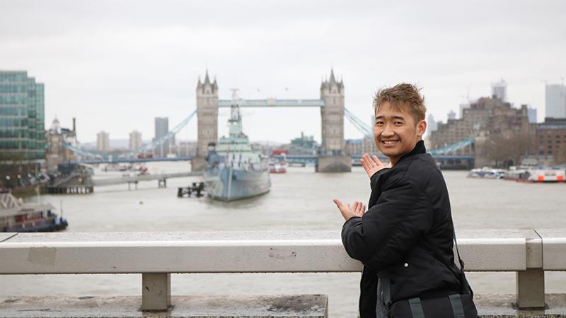 Student showing off Tower Bridge in London